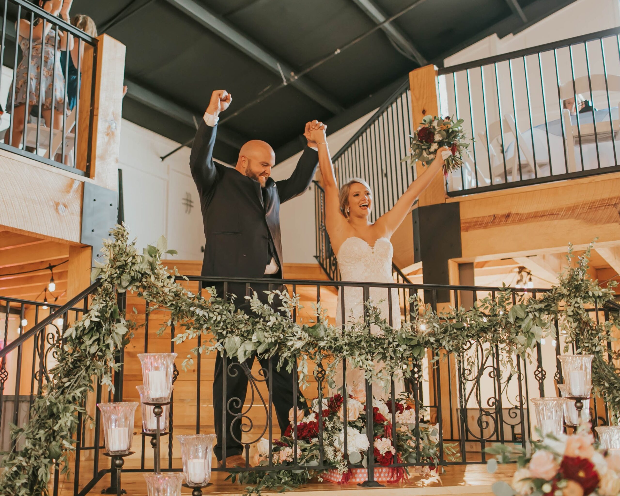 A newly married couple celebrating at The Vineyard Hall - A Rustic Wedding Venue
