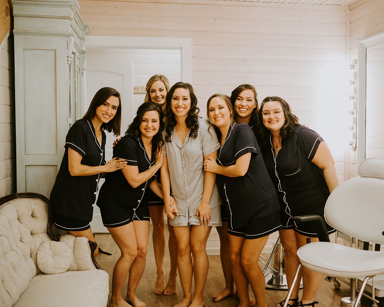 A bride and her bridesmaids in the bridal suite at The Vineyard Hall - A Rustic Wedding Venue